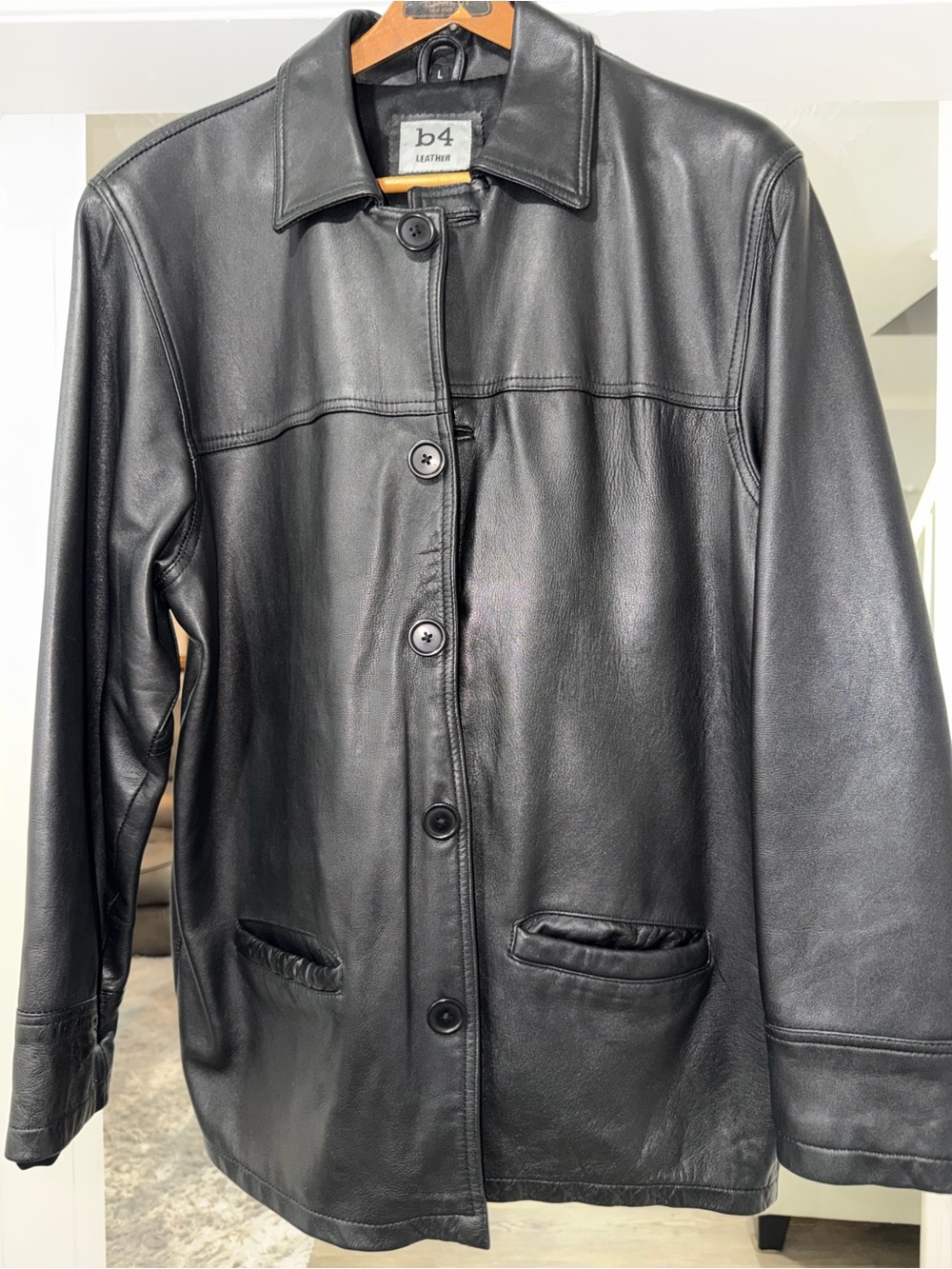 Man’s Black Leather Button-Front Jacket.
